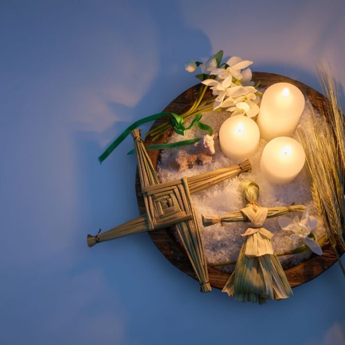 Imbolc altar with candles and spring symbols celebrating Celtic seasonal festival